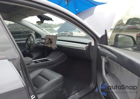 2023 Tesla Model Y Awd/Long Range Dual Motor All-Wheel Drive from USA, damaged, VIN 7SAYGDEE5PF876099